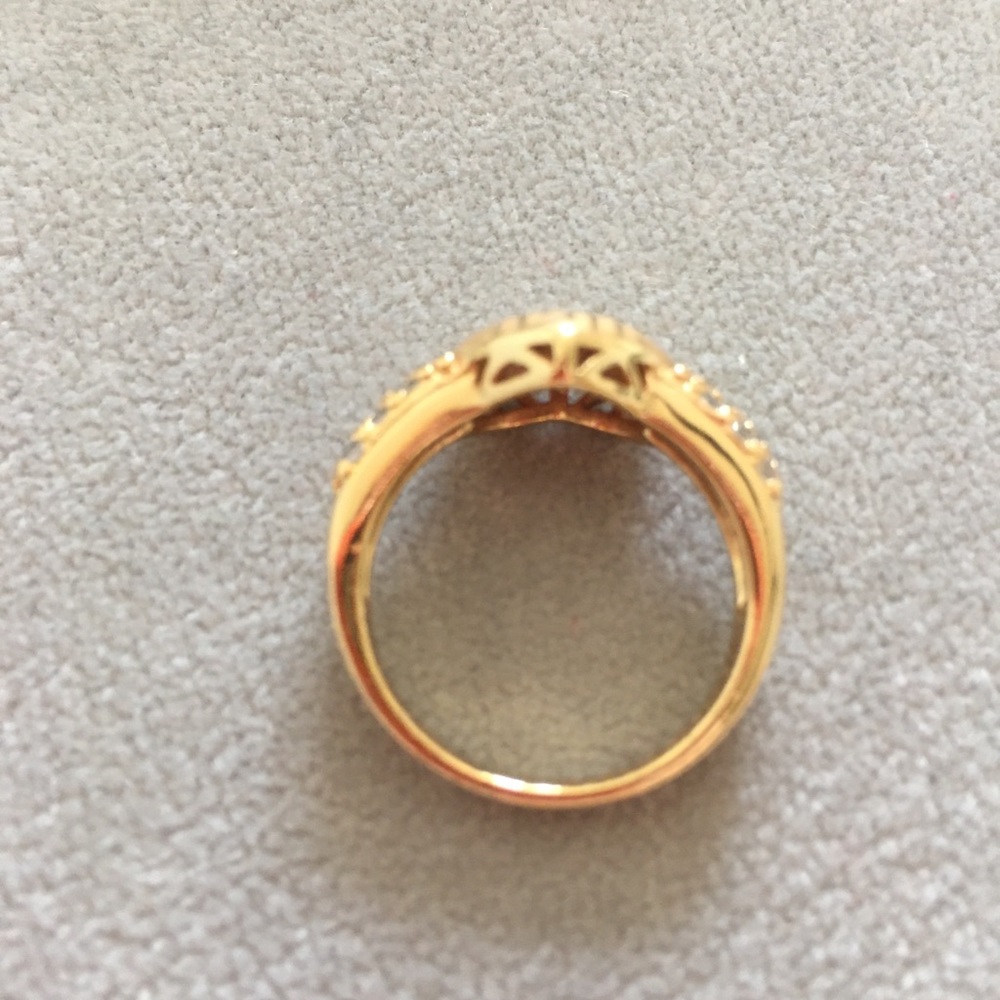 Very pretty ring. Yellow gold over base metal